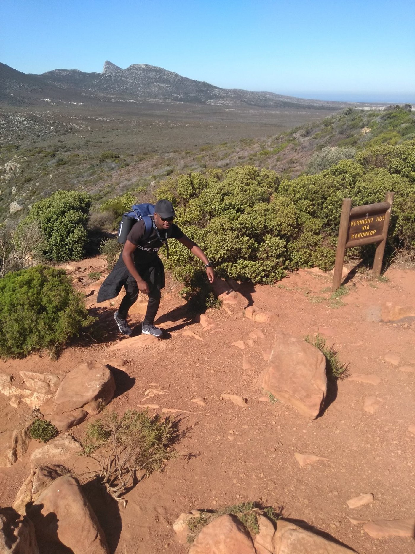 On the edge of a mountain overlooking the ocean
