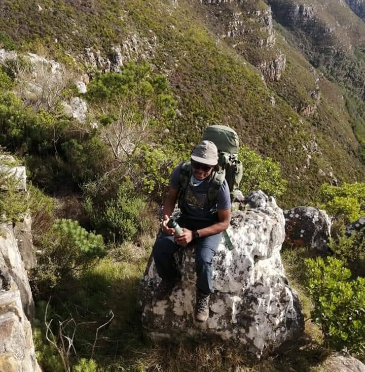 Malusi Ninela on a mountain hike